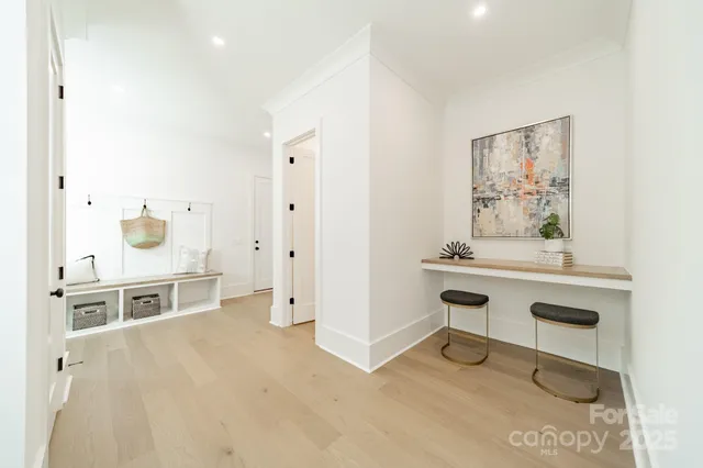 a view of a workspace with furniture