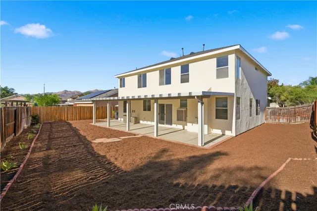 a view of a house with entertaining space