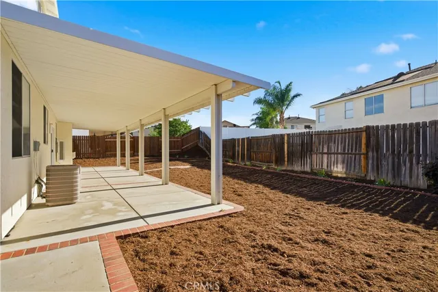 a view of small house with wooden floor