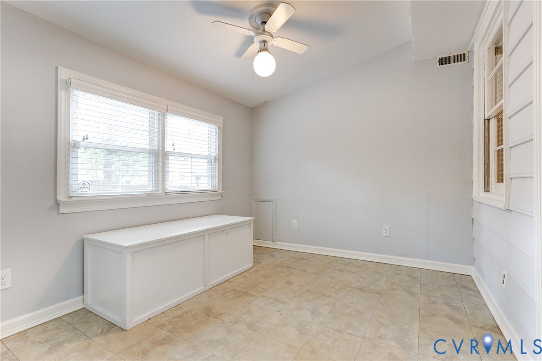 1401 Chowan Road Henrico, VA 23229 - Photo 17 of 39 Bright room featuring a vaulted ceiling and tile f