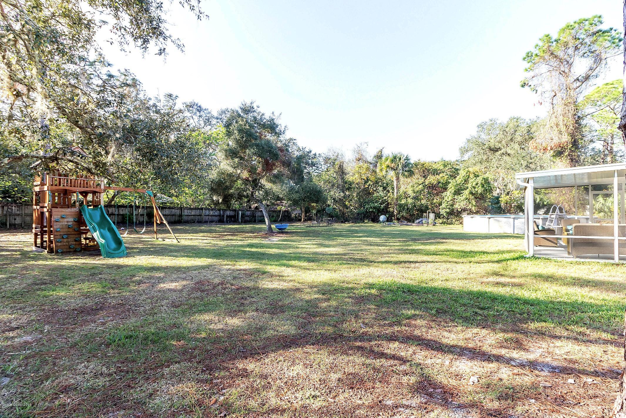 4435 Burkholm Road Mims, FL 32754 - Photo 6 of 23 bkyd