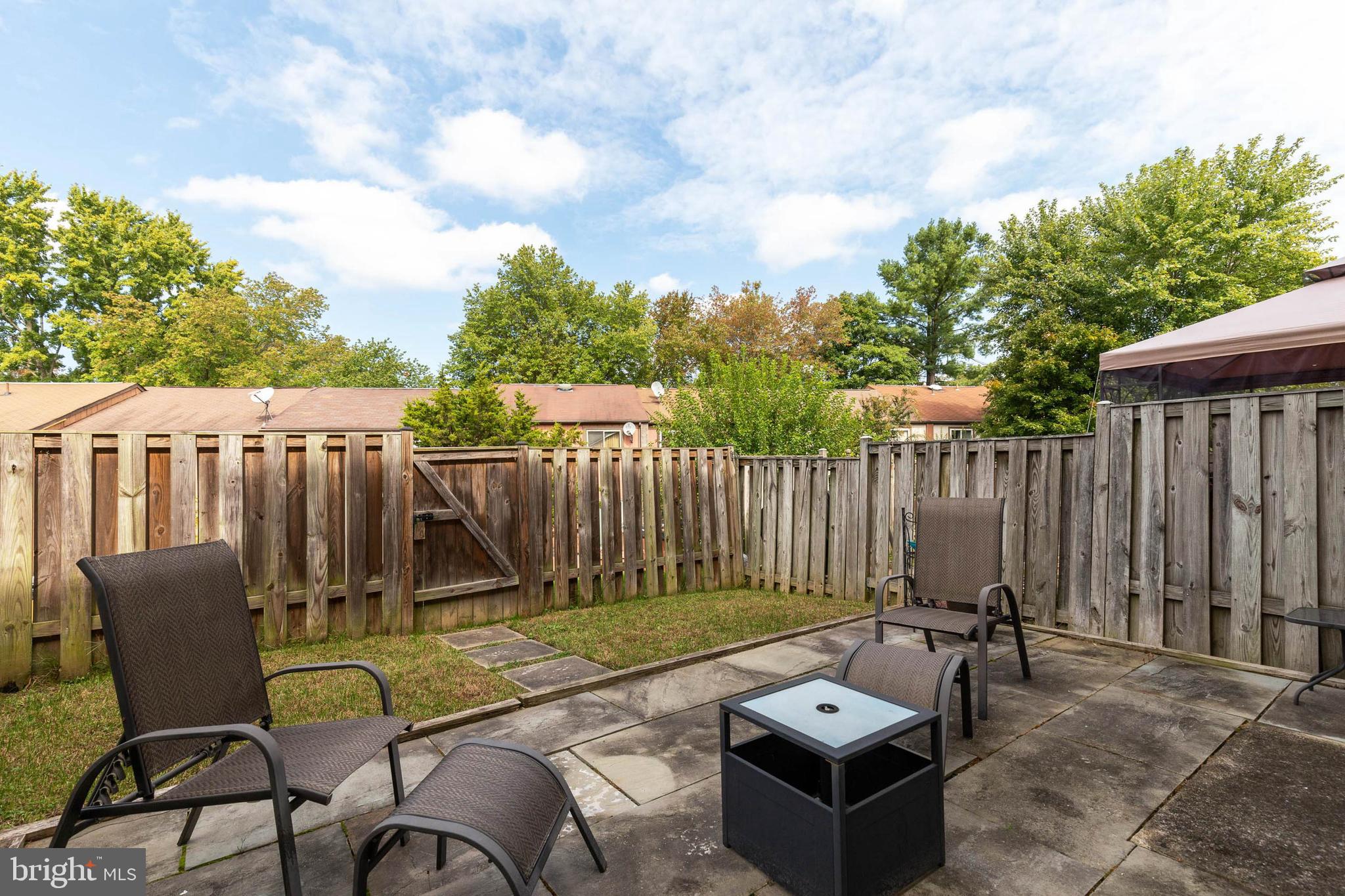 8980 Centerway Road Gaithersburg, MD 20879 - Photo 29 of 32 Backyard w/ Patio & Fence