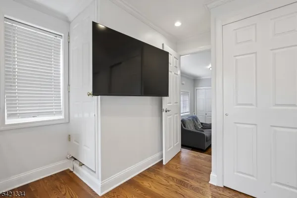 a bathroom with a toilet sink and a mirror