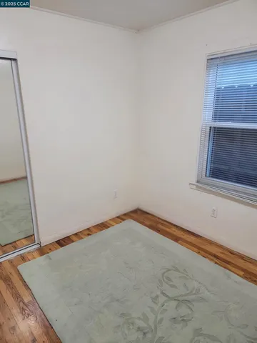 a view of a room with rack on the wall