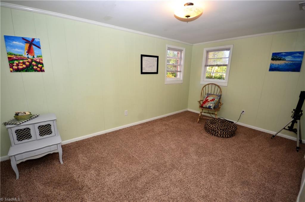 3019 W.O.W. Road Randleman, NC 27317 - Photo 13 of 23 Bedroom 2 with new carpet and crown molding