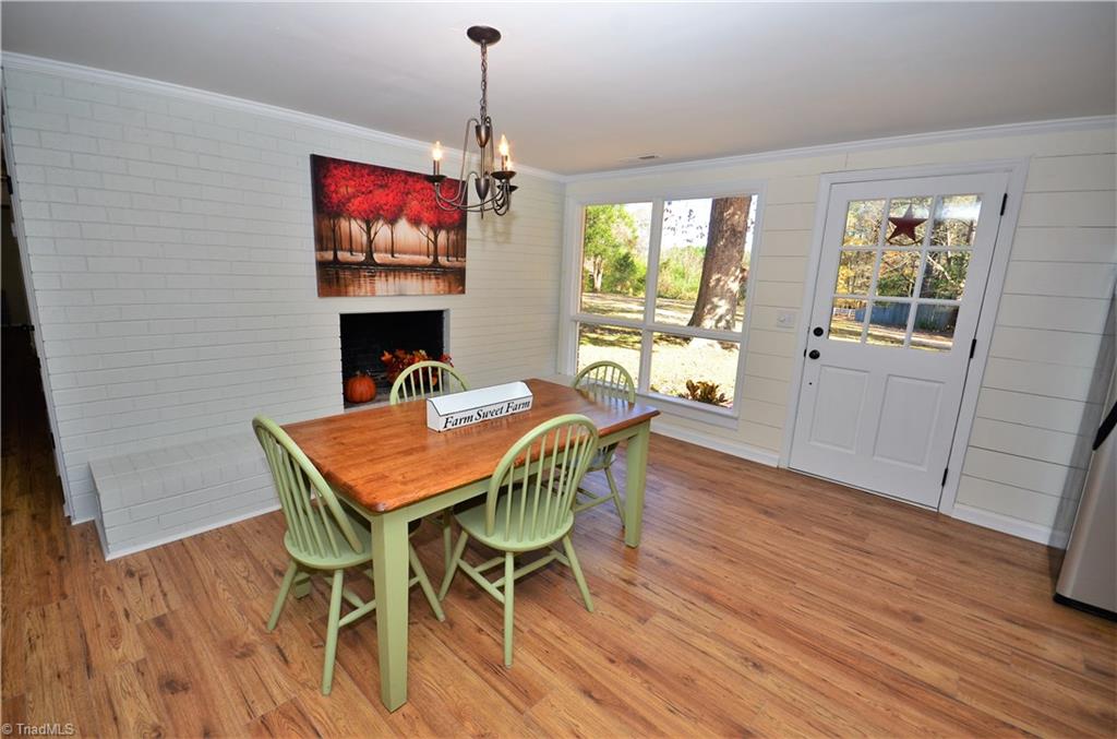 3019 W.O.W. Road Randleman, NC 27317 - Photo 4 of 23 Dining room with fireplace