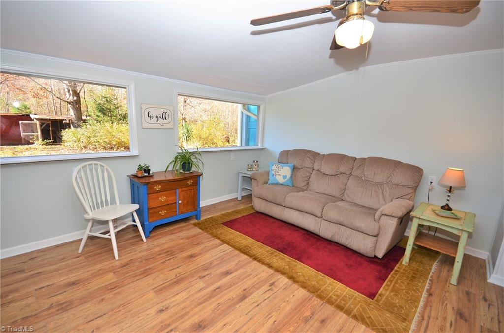 3019 W.O.W. Road Randleman, NC 27317 - Photo 6 of 23 Living room with new laminate floors