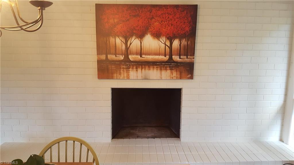 3019 W.O.W. Road Randleman, NC 27317 - Photo 7 of 23 Raised hearth fireplace