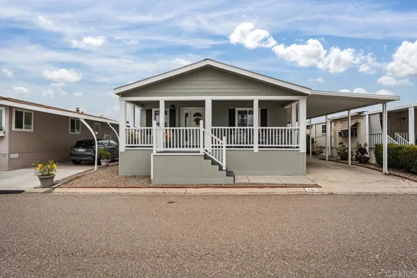 a front view of a house with a garage