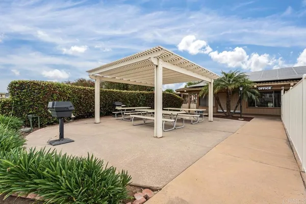 a view of a terrace with chairs