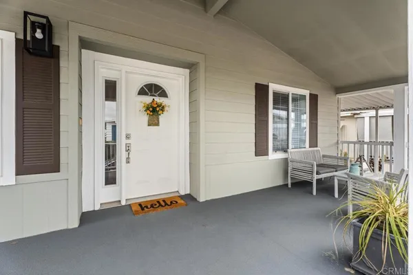 an entryway with a livingroom view
