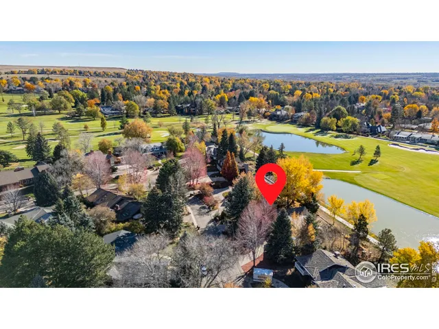 a swimming pool view with a lake view