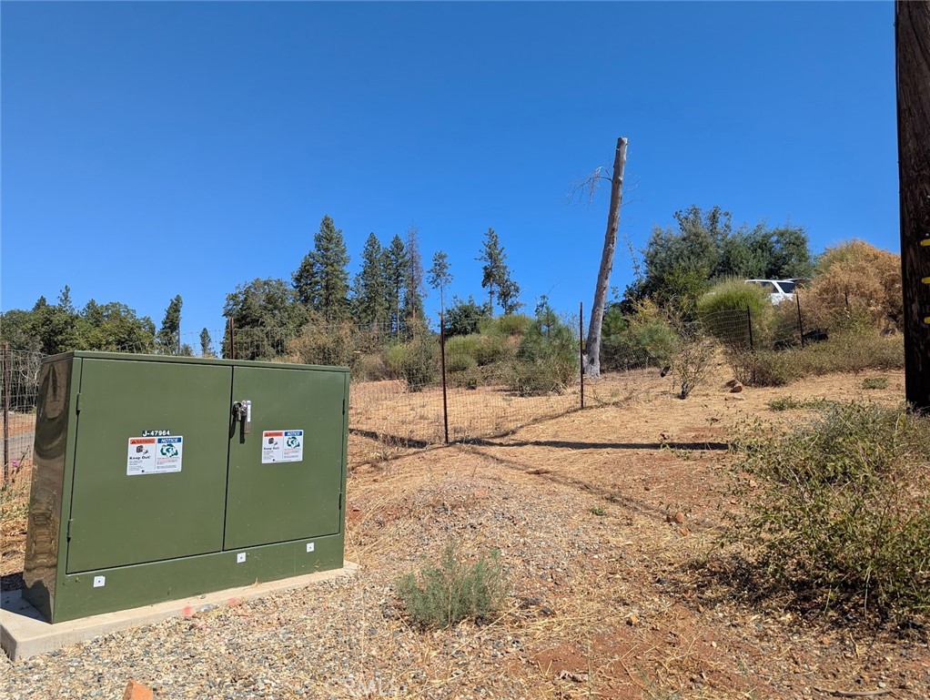 1067 Bille Road Paradise, CA 95969 - Photo 4 of 6 a view of a road with a building in the background