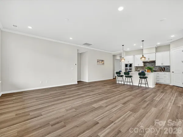 a view of kitchen with wooden floor