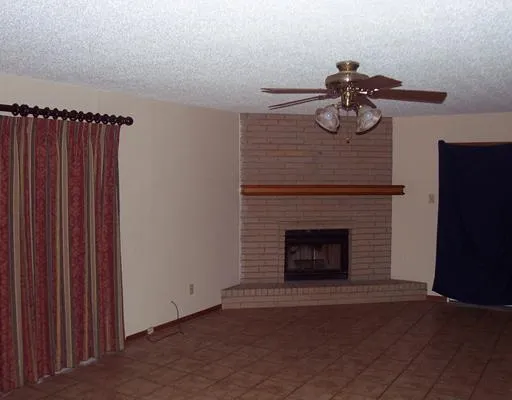 a view of a livingroom with a fireplace