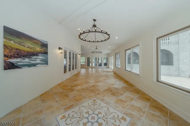 a very nice looking room with a chandelier