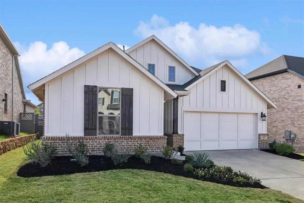 2221 Pika Road Northlake, TX 76247 - Photo 1 of 1 a front view of a house with garden