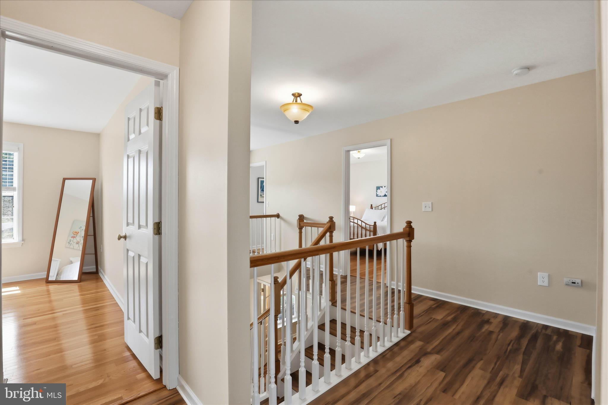 533 Thornberry Lane Lititz, PA 17543 - Photo 24 of 56 a view of a hallway with wooden floor and stairs