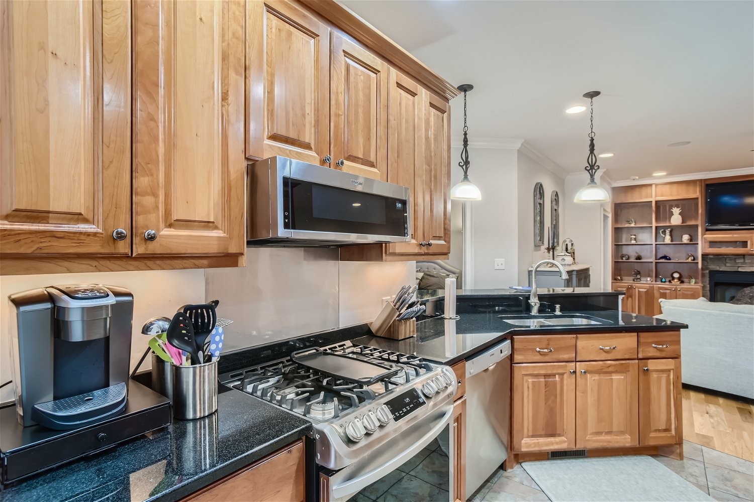 2378 Tom Fitzgerald Road Columbia, TN 38401 - Photo 11 of 34 a kitchen with stainless steel appliances granite countertop a stove a sink and a microwave