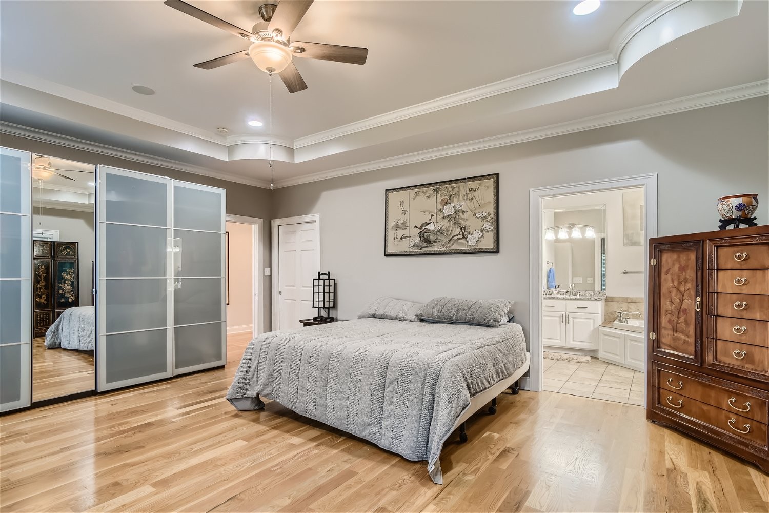 2378 Tom Fitzgerald Road Columbia, TN 38401 - Photo 13 of 34 a bedroom with a large bed a chandelier and closet