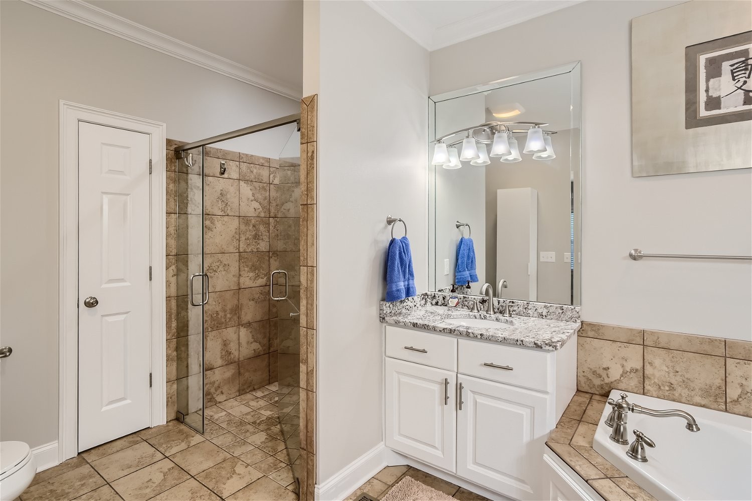 2378 Tom Fitzgerald Road Columbia, TN 38401 - Photo 15 of 34 a bathroom with a double vanity sink mirror and shower