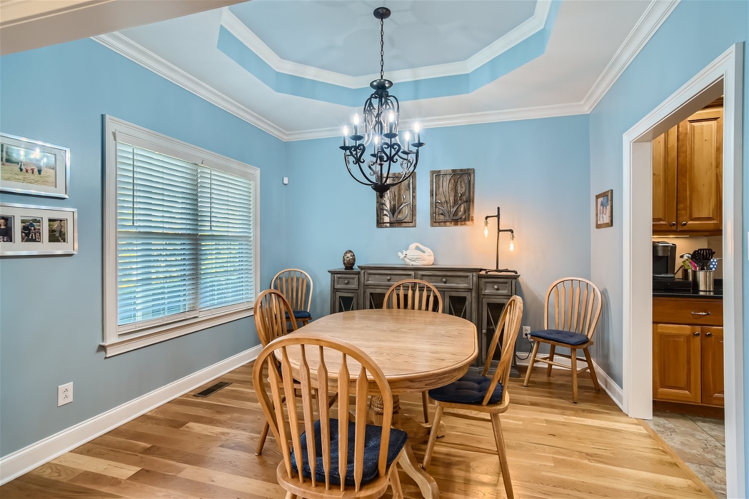 2378 Tom Fitzgerald Road Columbia, TN 38401 - Photo 8 of 34 a dining room with furniture a chandelier and wooden floor