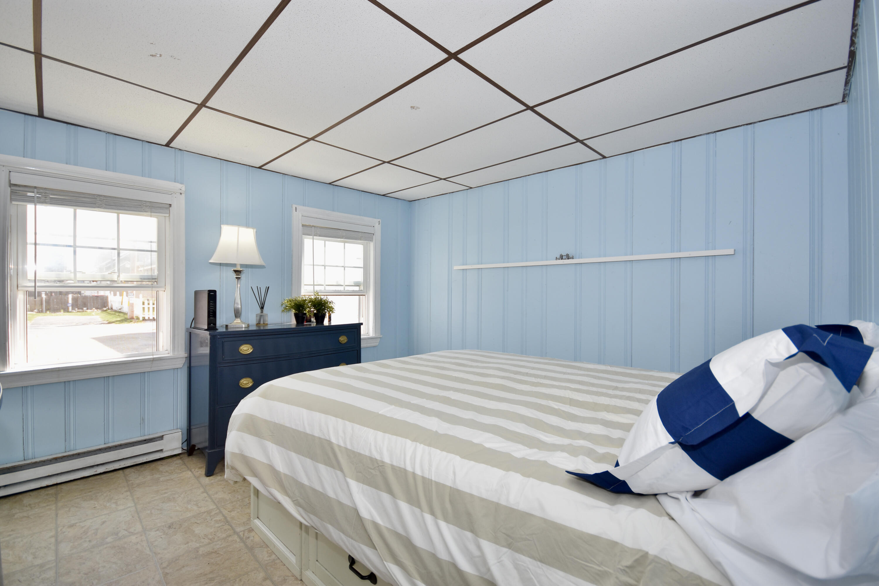 23 Barnes Street Wareham, MA 02571 - Photo 11 of 18 a bedroom with a bed and a window