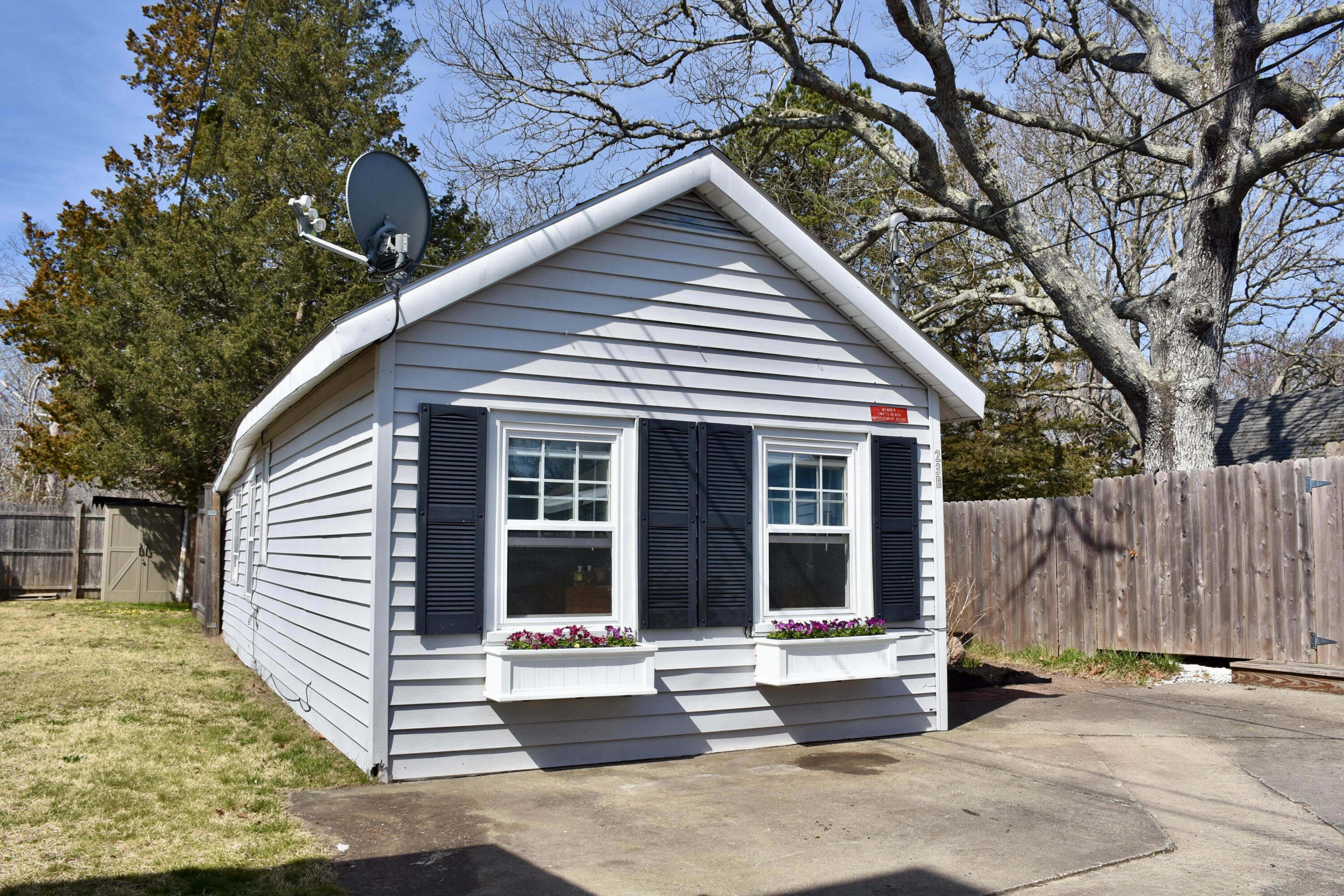 23 Barnes Street Wareham, MA 02571 - Photo 17 of 18 a view of a house with a patio