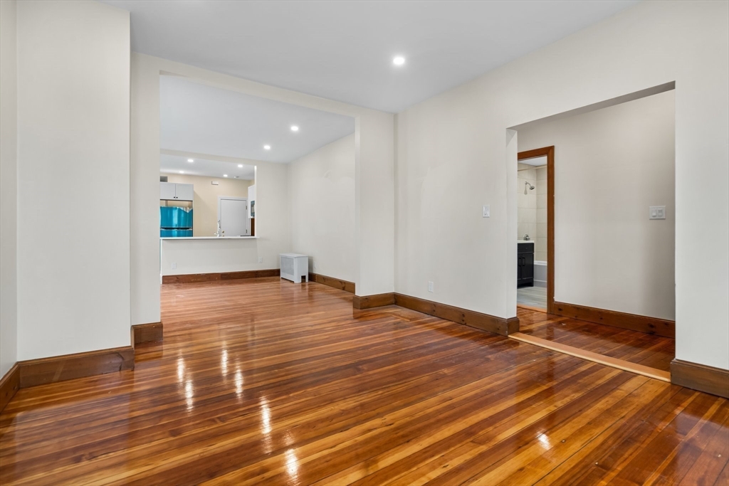 62 Vernal Street, Unit 3 Everett, MA 02149 - Photo 15 of 26 a view of empty room with wooden floor