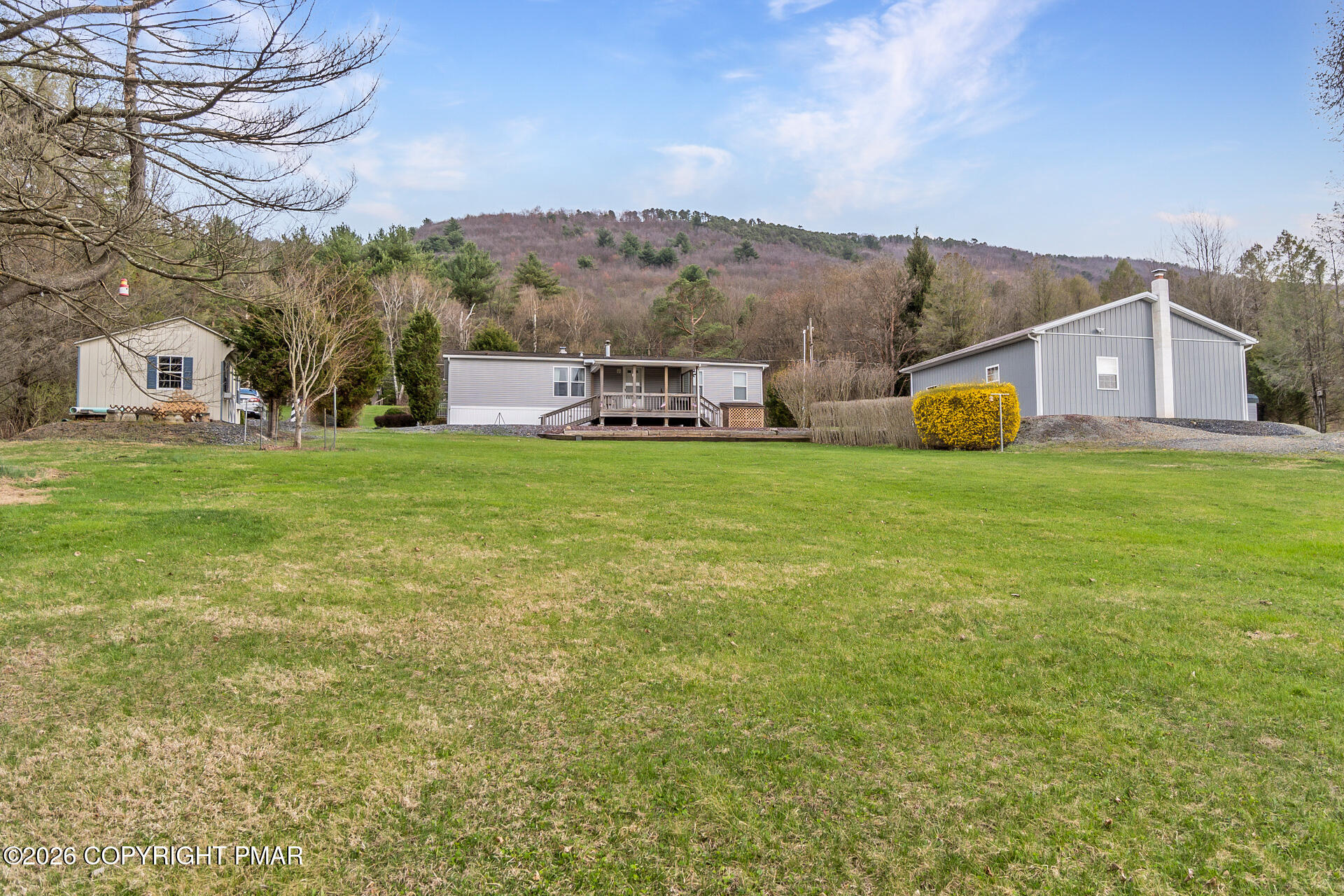 530 West Sunset Road Lehighton, PA 18235 - Photo 16 of 59 a view of a house with a big yard and large trees