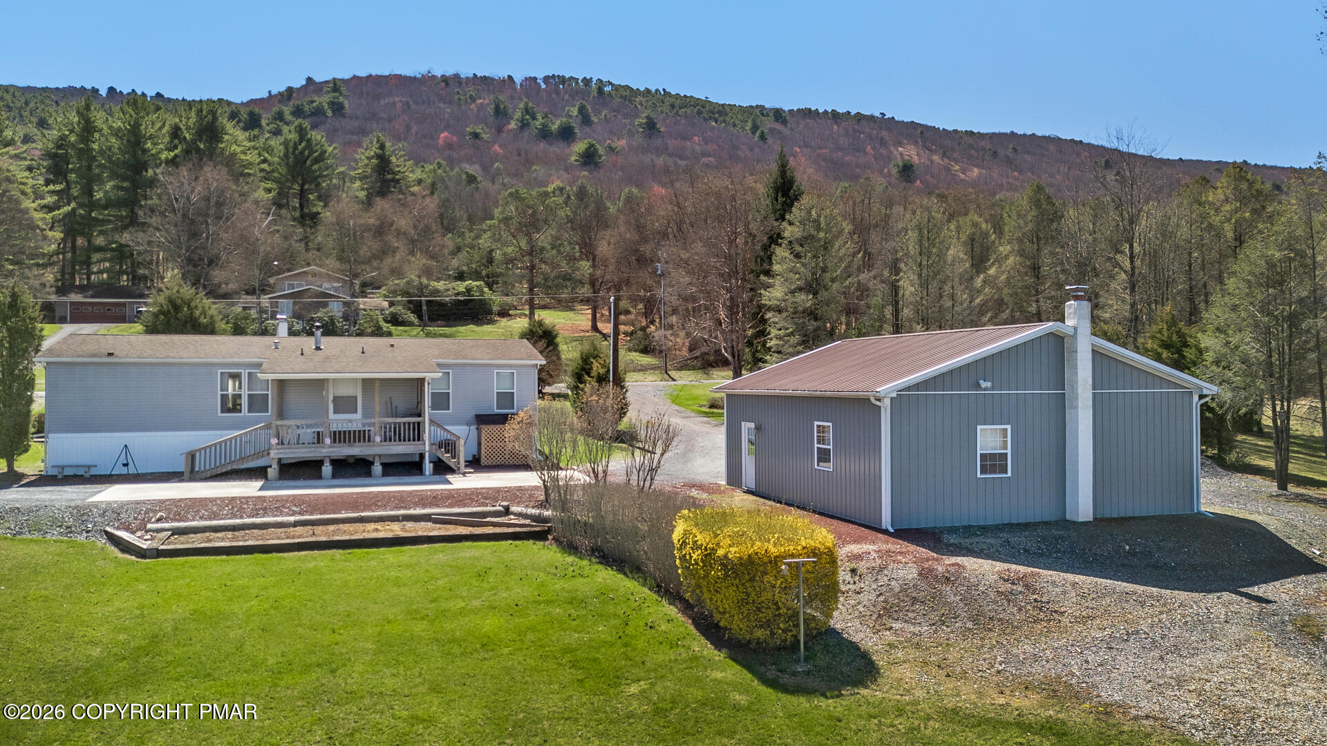 530 West Sunset Road Lehighton, PA 18235 - Photo 18 of 59 a view of a house with a garden and a mountain