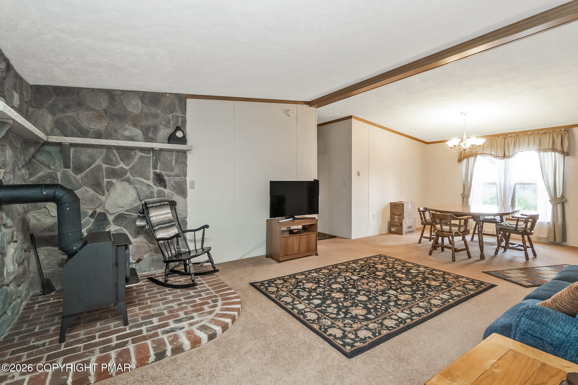 530 West Sunset Road Lehighton, PA 18235 - Photo 32 of 59 a living room with a couch and a table