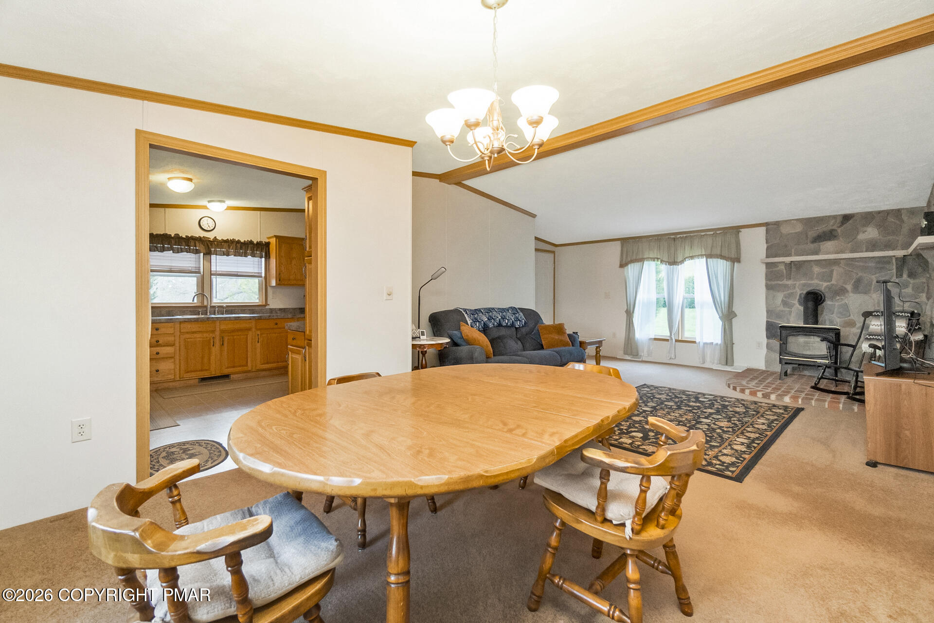 530 West Sunset Road Lehighton, PA 18235 - Photo 36 of 59 a view of a dining room with furniture and a chandelier
