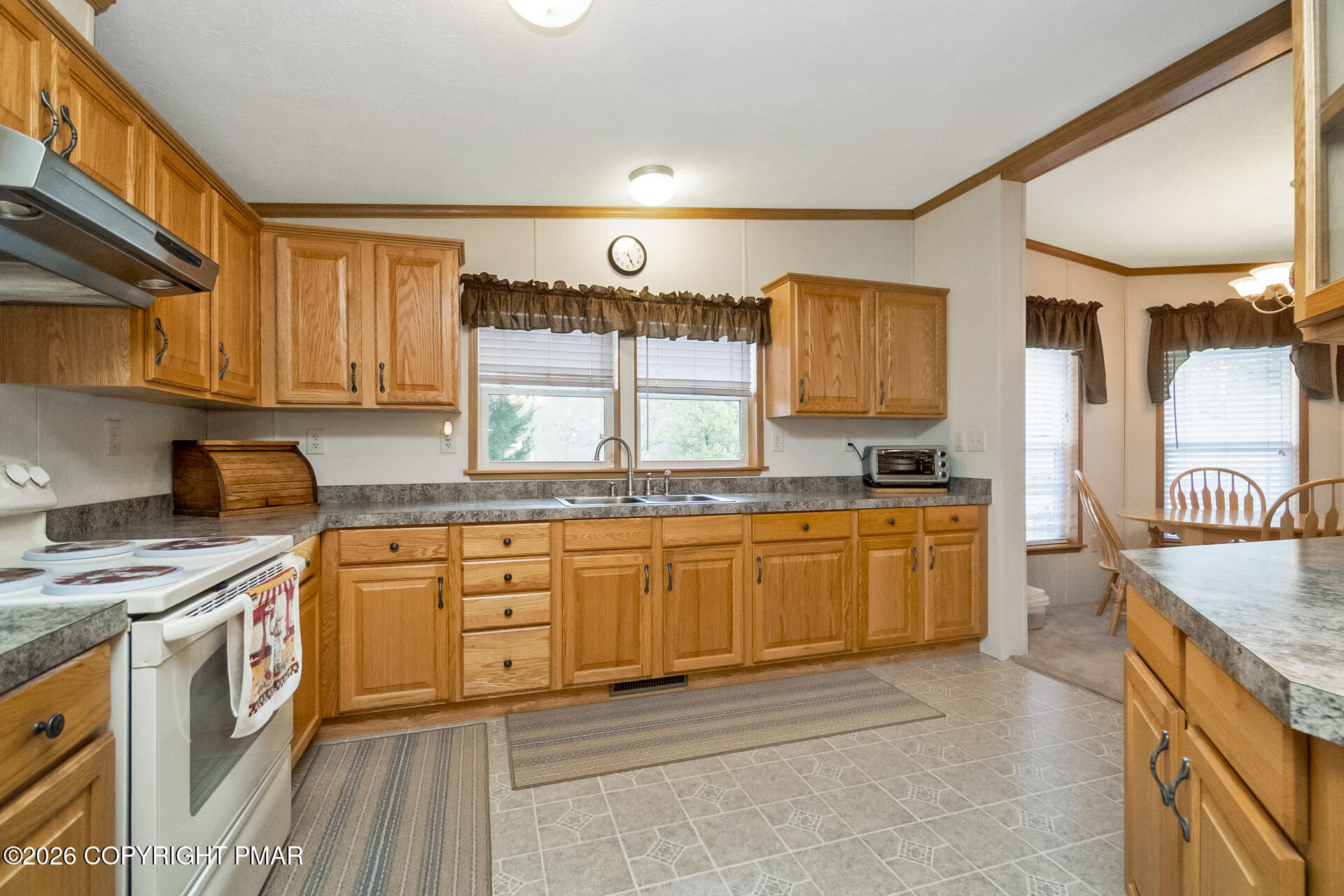 530 West Sunset Road Lehighton, PA 18235 - Photo 37 of 59 a kitchen with stainless steel appliances granite countertop a stove a sink and a refrigerator