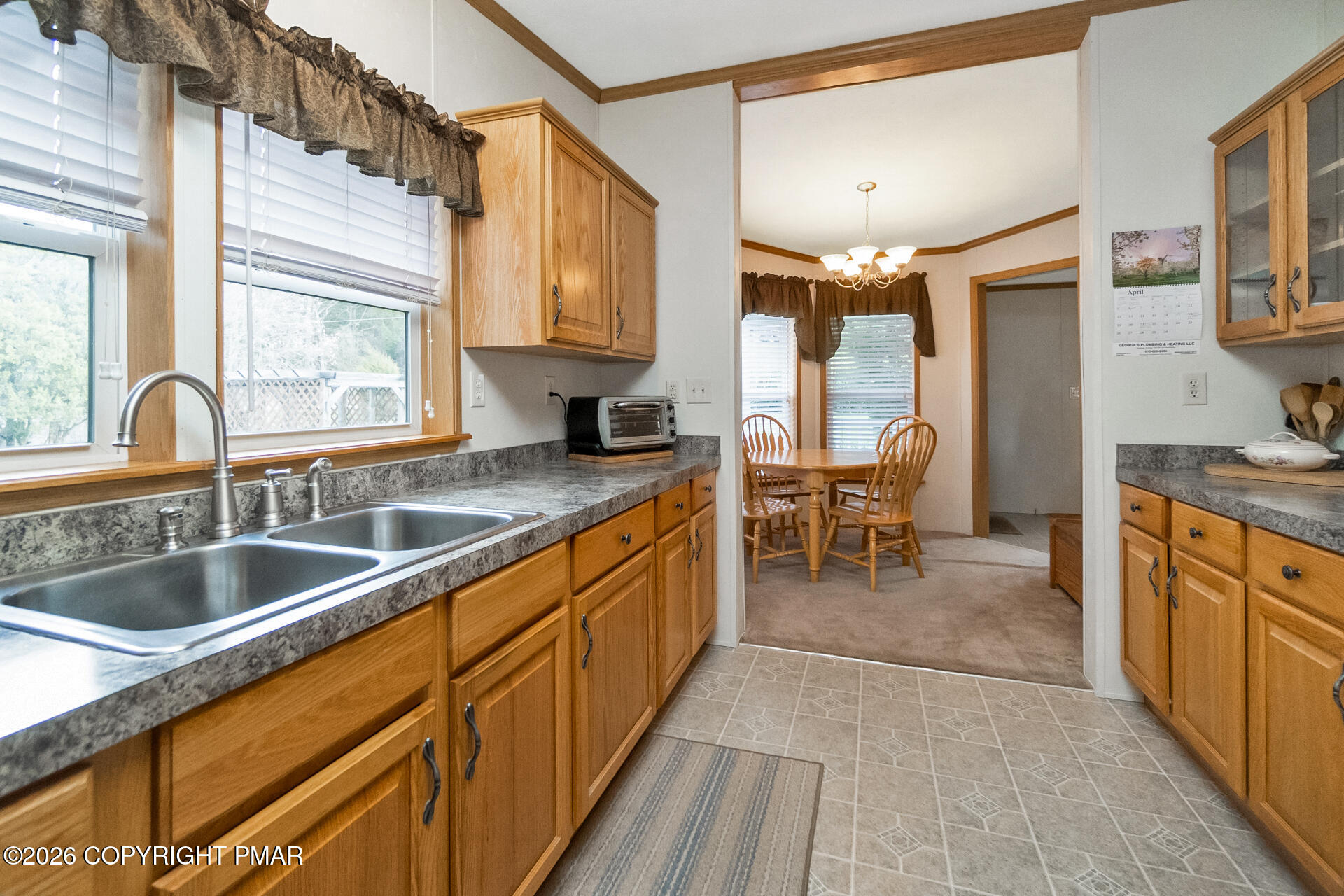 530 West Sunset Road Lehighton, PA 18235 - Photo 41 of 59 a kitchen with granite countertop a sink and cabinets