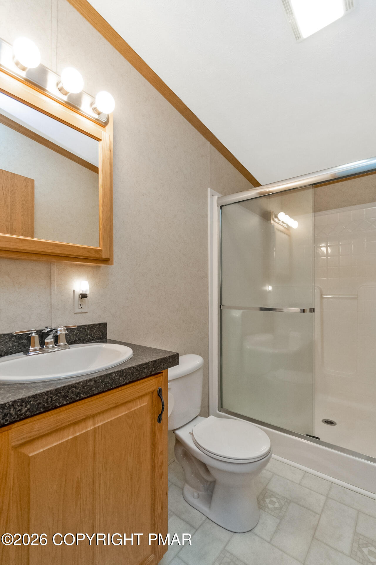 530 West Sunset Road Lehighton, PA 18235 - Photo 51 of 59 a bathroom with a granite countertop sink toilet a mirror and shower
