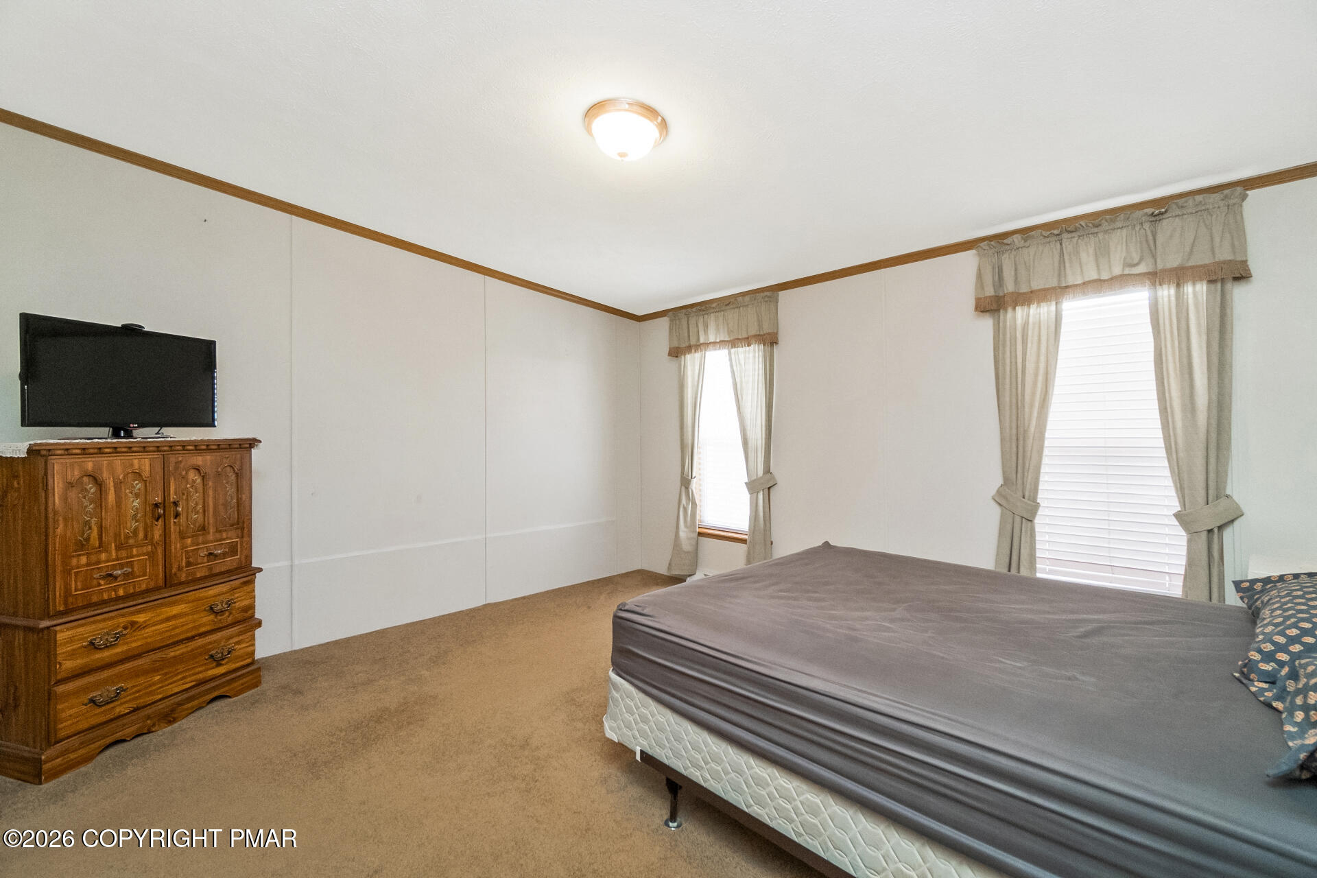 530 West Sunset Road Lehighton, PA 18235 - Photo 52 of 59 a bedroom with a bed and wooden floor