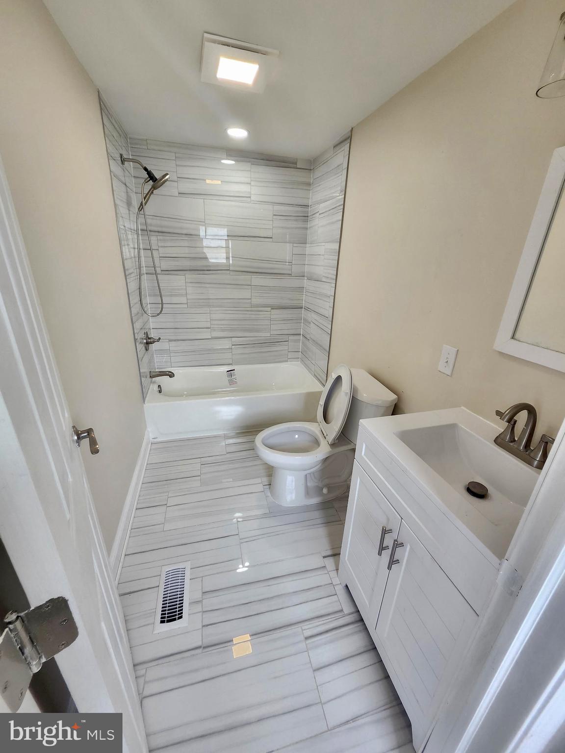 885 Buttonwood Avenue Spring City, PA 19475 - Photo 11 of 15 a bathroom with a sink and mirror