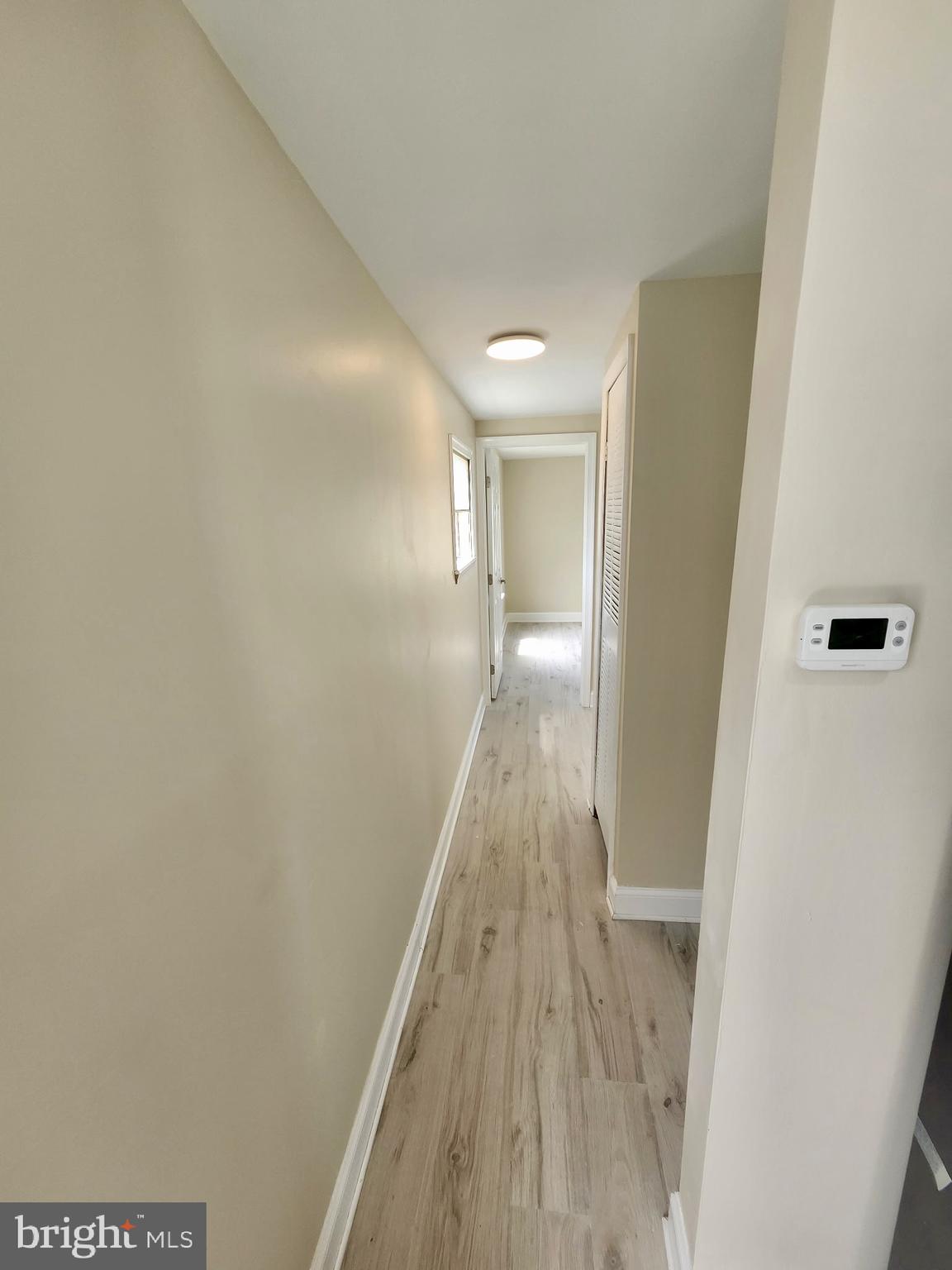 885 Buttonwood Avenue Spring City, PA 19475 - Photo 14 of 15 a view of a hallway with wooden floor
