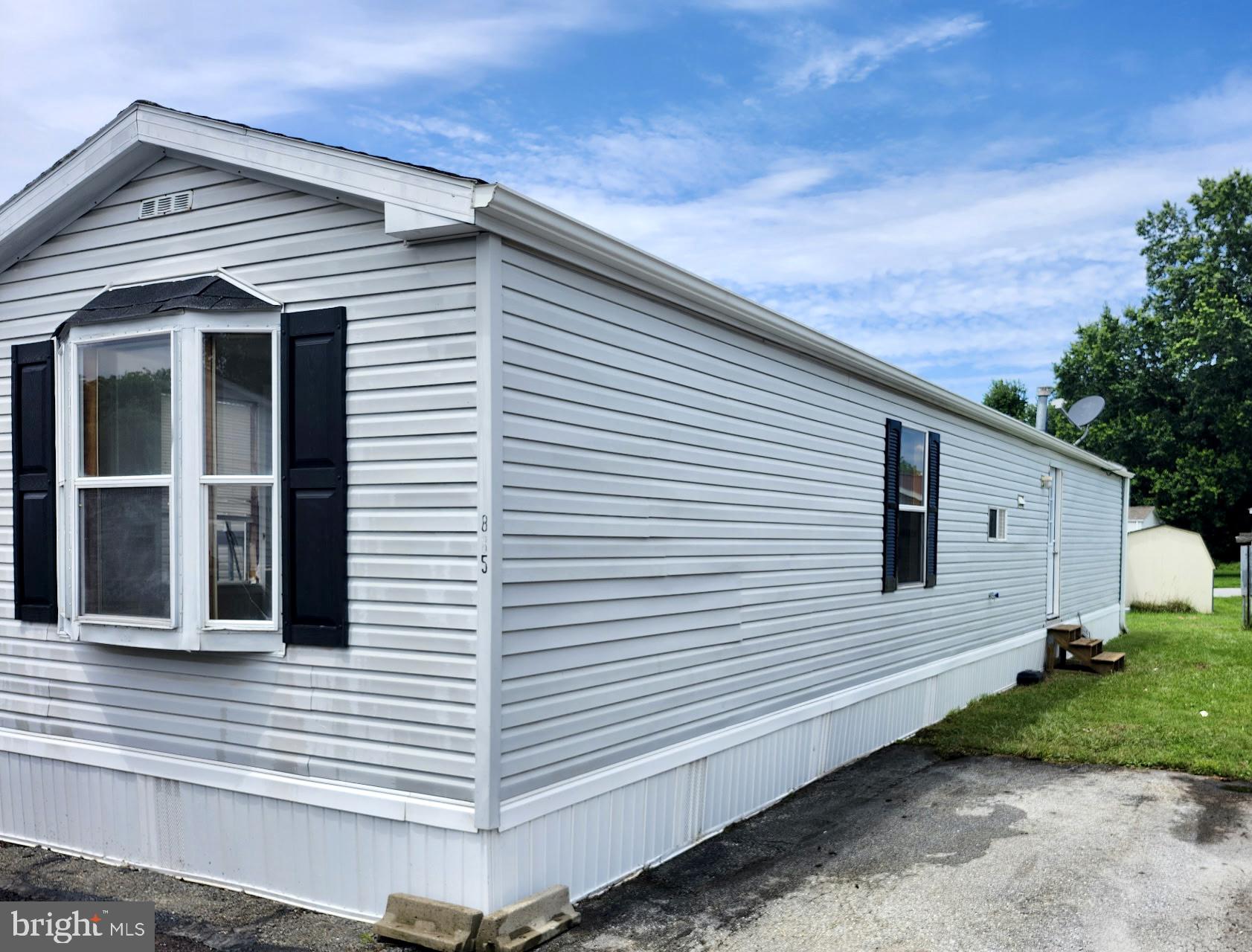 885 Buttonwood Avenue Spring City, PA 19475 - Photo 3 of 15 a view of a white house with many windows