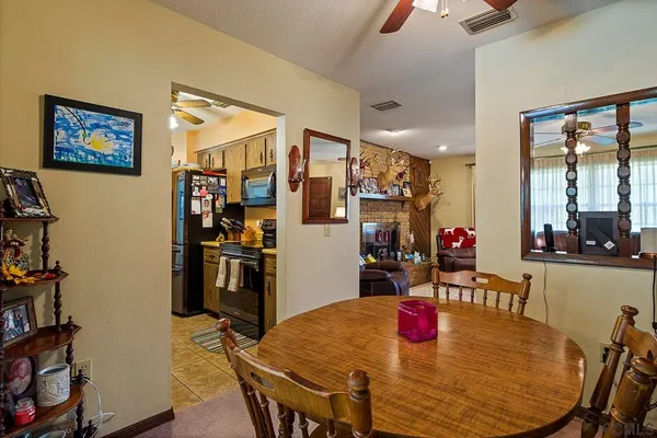 a view of a dining room with furniture
