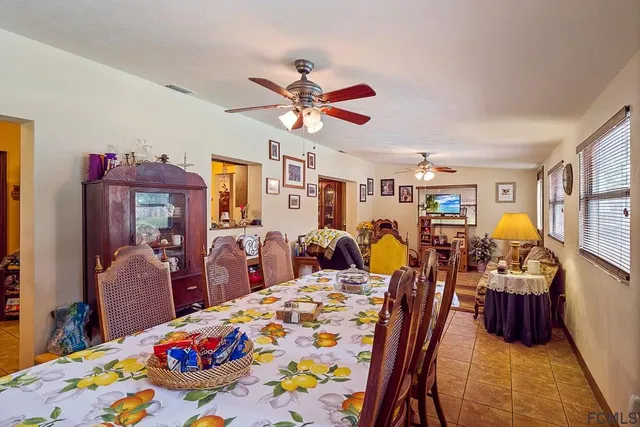 a bedroom with furniture and a wooden floor