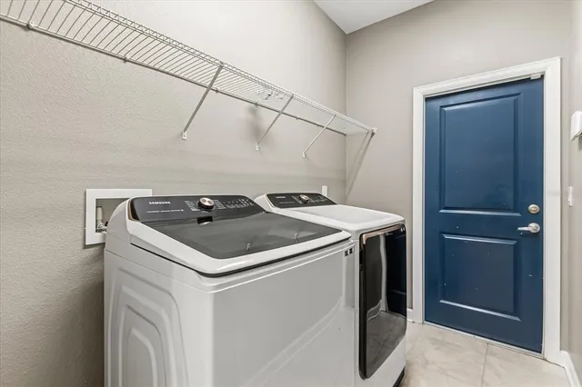 a view of a livingroom with an empty space and a window