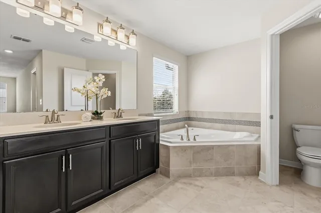 a view of an empty room and a window