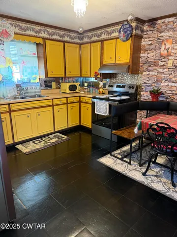 a bed room with a bed and a book shelf