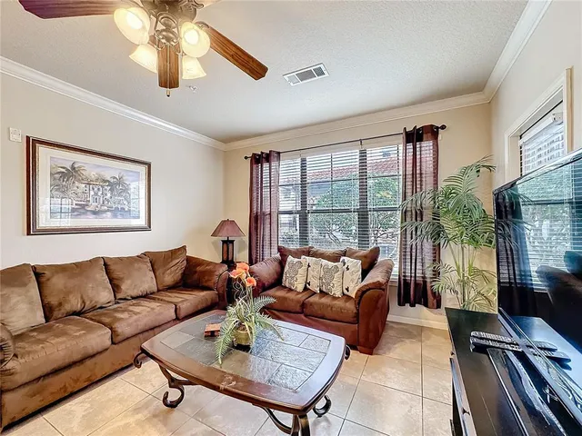 $130,000 | 912 Charo Parkway, Unit 214, Davenport, FL 33897