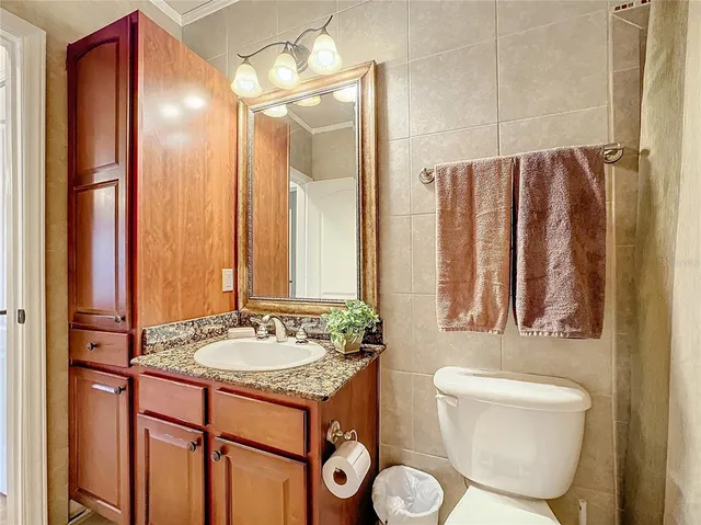 $130,000 | 912 Charo Parkway, Unit 214, Davenport, FL 33897