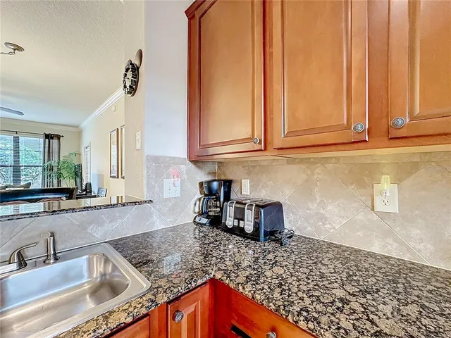 $130,000 | 912 Charo Parkway, Unit 214, Davenport, FL 33897