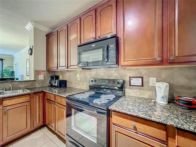 $130,000 | 912 Charo Parkway, Unit 214, Davenport, FL 33897