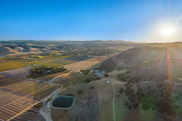 a view of mountain with sunset